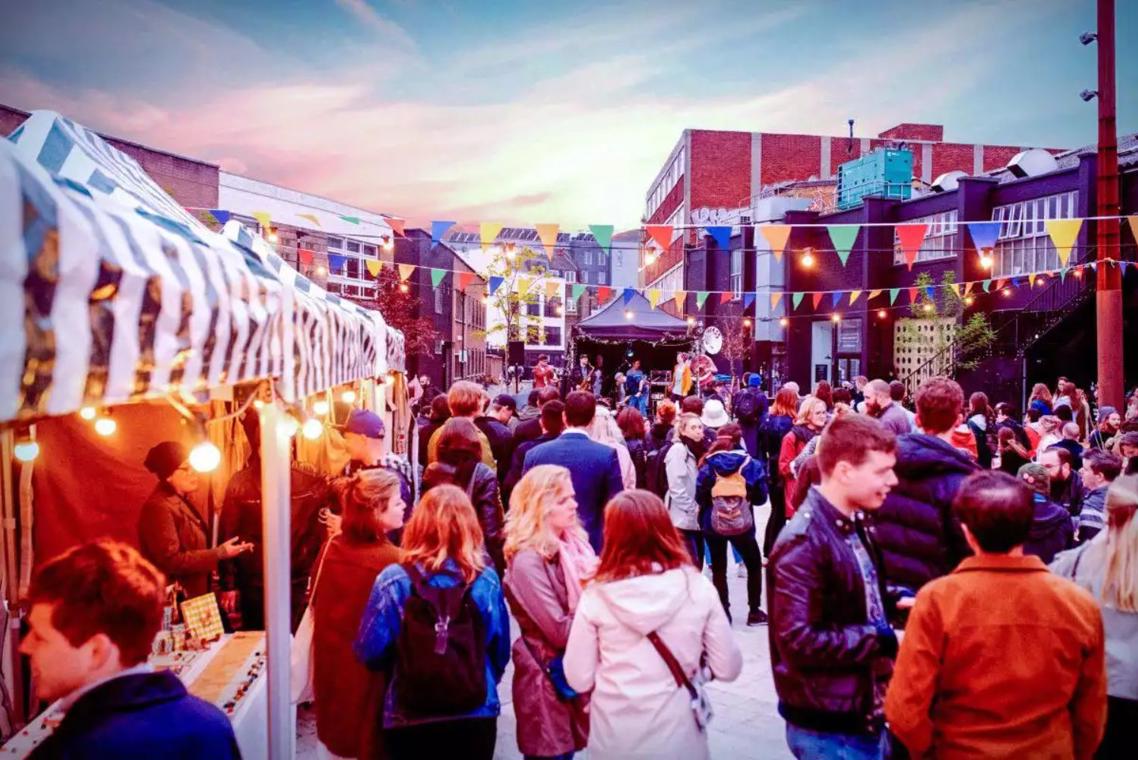 People enjoying a pop up event at the Oval