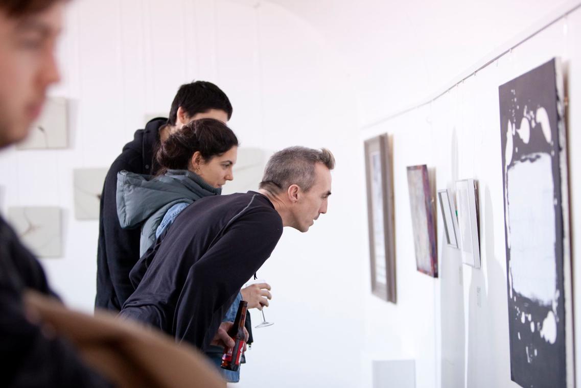 Viewers at an art exhibition