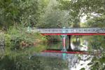 The ornamental Chinese bridge across the lake
